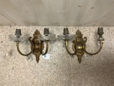 TWO BRASS AND CUT GLASS WALL LIGHTS