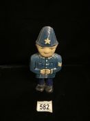 A VINTAGE TIN PLATE POLICEMAN WIND UP TOY, HEIGHT 19CM