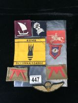 A QUANTITY OF MILITARY CLOTH BADGES, INCLUDING; BOMB RECONNAISSANCE, 53RD WELSH INFANTRY, 8TH