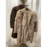 TWO MID-LENGTH BROWN FUR COATS, BOTH FULLY LINED, ONE MID-BROWN, THE OTHER LIGHT BEIGE, UK SIZE 14