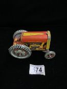 A VINTAGE TIN TOY TRACTOR, MARKED 'MADE IN GT BRITAIN', LENGTH 13.5CM