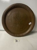 VINTAGE COPPER JOHNNIE WALKER EMBOSSED SERVING TRAY FROM THE FACTORY; 34CM DIAMETER