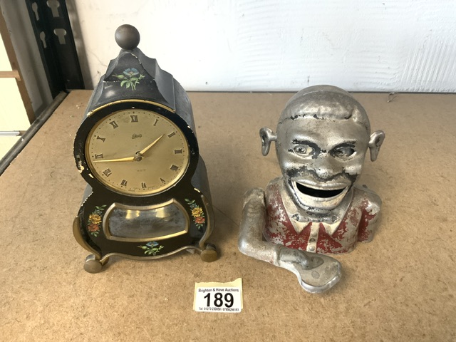 VINTAGE MONEY BOX WITH A SHATZ WOODEN FRAMED CLOCK; 22CM