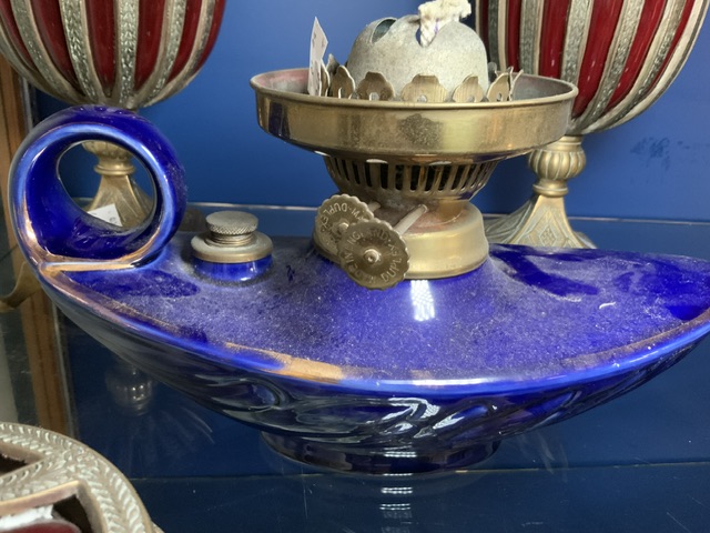 TWO BRASS AND CRANBERRY CONTAINERS WITH A CERAMIC OIL LAMP LARGEST; 40CM - Image 3 of 5