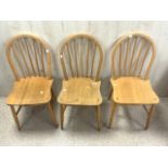 THREE VINTAGE ERCOL STICK BACK DINING CHAIRS