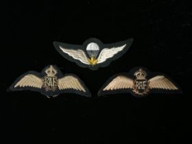 TWO RAF CLOTH BADGES AND A CANADIAN PARACHUTE WINGS CLOTH BADGE; LENGTH 11.5CM