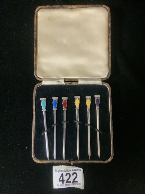 A CASED SET OF STERLING SILVER AND ENAMEL NOVELTY COCKTAIL STICKS BY ROBERTS & DORE; BIRMINGHAM