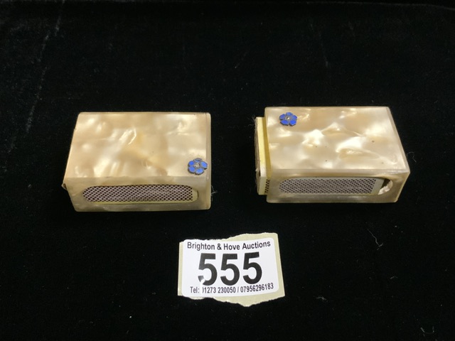 TWO VINTAGE MOTHER OF PEARL STYLE MATCHBOX COVERS, EACH WITH AN APPLIED ENAMEL FLOWER; LENGTH 6CM