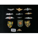 A QUANTITY OF METAL AND ENAMEL SOUTH AFRICAN PARACHUTE REGIMENT CAP BADGES AND LARGER BADGES