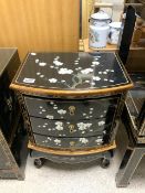 CHINOISERIE BLACK LACQUERED BOW FRONTED AND HIGHLY DECORATED THREE DRAWER CHEST; 46 X 33 CM