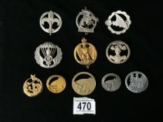 A QUANTITY OF FRENCH MILITARY METAL CAP BADGES INCLUDING LIGNE MAGINOT, JOINVILLE, COMMANDO DE