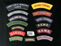 A QUANTITY OF MILITARY CLOTH SHOULDER TITLES INCLUDING ROYAL ARMY PAY CORPS, CHESHIRE YEOMANRY,