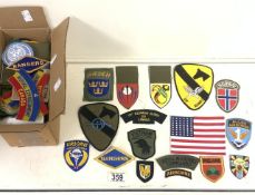 A QUANTITY OF MILITARY CLOTH BADGES AND COUNTRY PATCHES INCLUDING; UNITED NATIONS, CANADIAN