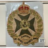 A LARGE MILITARY EMBROIDERED CLOTH BADGE; THE PRINCE CONSORTS OWN RIFLE BRIGADE