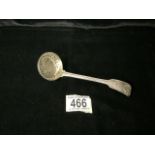 A VICTORIAN STERLING SILVER FIDDLE THREAD AND SHELL SUGAR SIFTING SPOON BY GEORGE ADAMS; LONDON