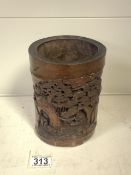 AN ANTIQUE CHINESE CARVED BAMBOO BRUSH POT, POSSIBLY LATE QING DYNASTY, DECORATED WITH A LANDSCAPE