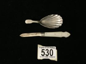 A GEORGE III STERLING SILVER FIDDLE PATTERN CADDY SPOON; MAKERS MARK 'GH'; LION PASSANT AND DUTY