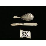 A GEORGE III STERLING SILVER FIDDLE PATTERN CADDY SPOON; MAKERS MARK 'GH'; LION PASSANT AND DUTY