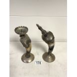 WHITE METAL AND HORN EASTERN CANDLESTICK WITH ONE OTHER; 25CM