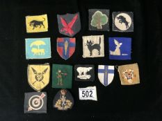 A QUANTITY OF MILITARY CLOTH BADGES INCLUDING ANTI AIRCRAFT, NORTH MIDLANDS, WEST AFRICAN, 11TH