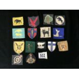 A QUANTITY OF MILITARY CLOTH BADGES INCLUDING ANTI AIRCRAFT, NORTH MIDLANDS, WEST AFRICAN, 11TH