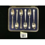 A CASED SET OF SIX STERLING SILVER TEASPOONS BY MAPPIN & WEBB; SHEFFIELD 1947; REEDED BORDERS;