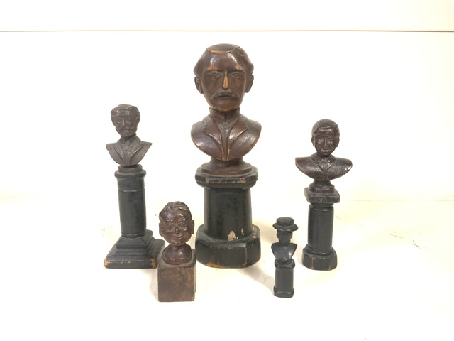 FIVE VINTAGE CARVED WOOD MINIATURE BUSTS OF GENTLEMAN ON PLINTHS; LARGEST 16.5CM