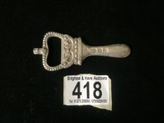 A STERLING SILVER NOVELTY COMMEMORATIVE BOTTLE OPENER BY C.J.VANDER; LONDON 1973, IN THE FORM OF A