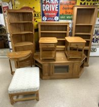 ERCOL FURNITURE INCLUDES BOOKCASE, TWO BEDSIDE CHESTS, CABINETS AND CORNER UNIT AND CONSOLE TABLE