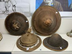 FOUR VINTAGE ASIAN CONICAL HATS