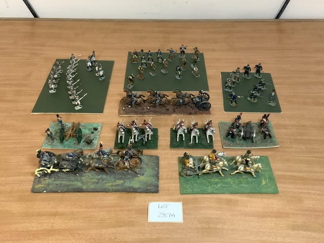 QUANTITY OF MINIATURE MILITARY FIGURES MOUNTED AS BATTLE SCENES