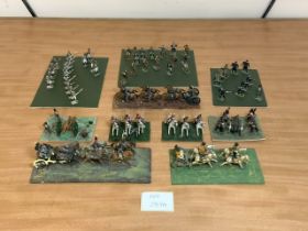 QUANTITY OF MINIATURE MILITARY FIGURES MOUNTED AS BATTLE SCENES