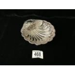 AN EDWARDIAN STERLING SILVER SHELL SHAPED BON BON DISH BY H. ATKINS; SHEFFIELD 1901; PIERCED AND