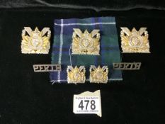 A COLLECTION OF CANADIAN MILITARY CAP BADGES AND SHOULDER TITLES FOR THE PERTH REGIMENT, TOGETHER