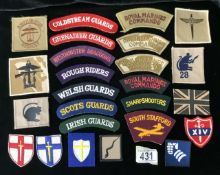 A QUANTITY OF MILITARY CLOTH SHOULDER TITLES INCLUDING SOUTH STAFFORD, AMPHIBIOUS ASSAULT, WELSH