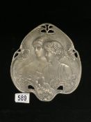 AN ART NOUVEAU PEWTER DISH, SHAPED TREFOIL FORM, EMBOSSED WITH FEMALES IN PROFILE,AND STYLISED