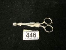 A PAIR OF ANTIQUE GEORGIAN STERLING SILVER SCISSOR ACTION SUGAR NIPS; MARKS RUBBED; SHELL GRIPS;