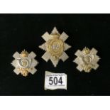 THREE METAL MILITARY CAP BADGES COMPRISING; 42ND BATTALION, THE BLACK WATCH AND TWO HIGHLAND LIGHT