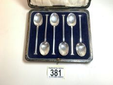 A CASED SET OF SIX STERLING SILVER TEASPOONS BY C. W. FLETCHER; SHEFFIELD 1922; SEAL END; LENGTH