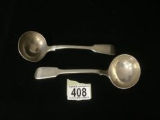 A PAIR OF VICTORIAN STERLING SILVER FIDDLE PATTERN SAUCE LADLES BY GEORGE ADAMS; LONDON 1858;