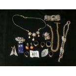 A QUANTITY OF COSTUME JEWELLERY INCLUDING; A MARCASITE BRACELET, RINGS, BROOCHES AND CHAINS