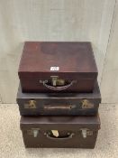 THREE VINTAGE LEATHER SUITCASES ONE WITH LUGGAGE LABELS AND ONE WITH INNER SHELF LARGEST 45 X 39CM