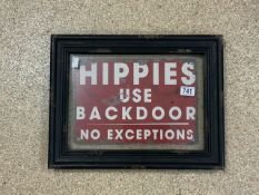 FRAMED AND GLAZED SIGN (HIPPIES USE BACKDOOR NO EXCEPTIONS) 48 X 36CM