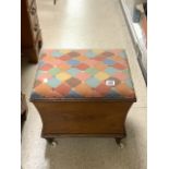 VINTAGE STOOL WITH INNER STORAGE AND HARLEQUIN MATERIAL ON CASTORS