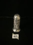 A STERLING SILVER SUGAR CASTER; BIRMINGHAM 1914; EMBOSSED WITH INIDIAN VILLAGE SCENES; VACANT