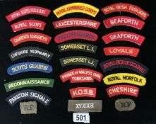 A QUANTITY OF CLOTH MILITARY SHOULDER TITLES INCLUDING ROYAL NORFOLK, PAKISTAN SIGNALS, THE LIFE
