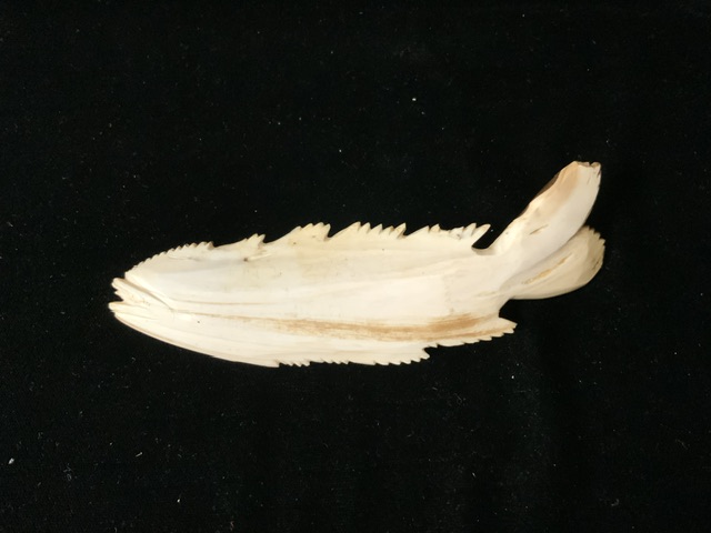 AN ANTIQUE CARVED BONE MODEL OF A FISH; REALISTICALLY MODELLED AND CARVED WITH FISH SCALES; LENGTH - Image 2 of 2