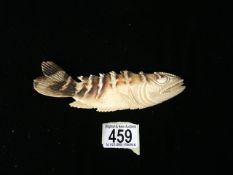 AN ANTIQUE CARVED BONE MODEL OF A FISH; REALISTICALLY MODELLED AND CARVED WITH FISH SCALES; LENGTH