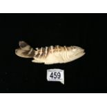 AN ANTIQUE CARVED BONE MODEL OF A FISH; REALISTICALLY MODELLED AND CARVED WITH FISH SCALES; LENGTH