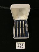 A BOXED SET OF FOUR STERLING SILVER AND ENAMEL BRIDGE PROPELLING PENCILS; BIRMINGHAM 1990; ENGINE